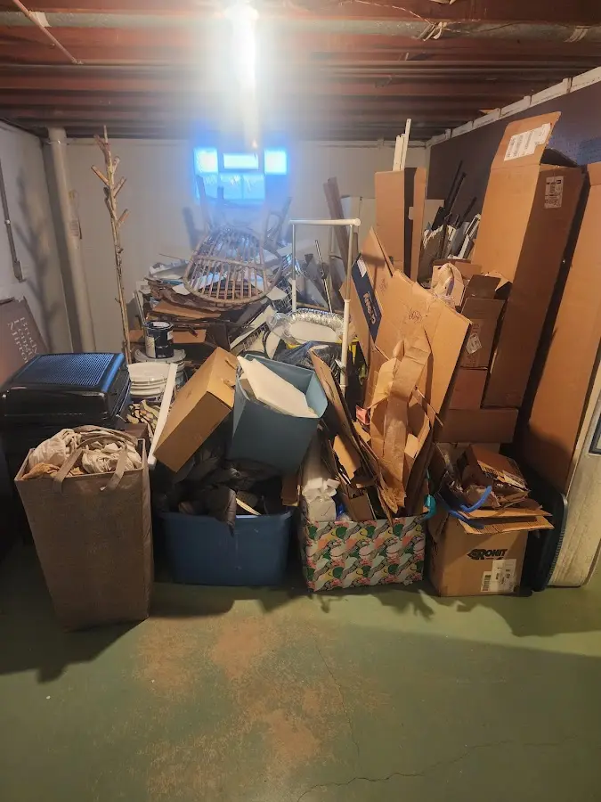 Roll-off dumpster container at job site for 6 Yard Dumpster Rental in New Castle